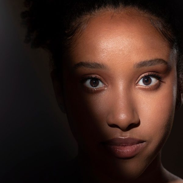 portrait-beautiful-black-woman-with-mysterious-shadows_23-2149095703